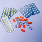 a close up of pills and tablets on a table